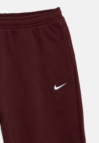 Nike pantalone sportivo da ragazza Sportswear Studio Fleece IM4905-658 bordeaux