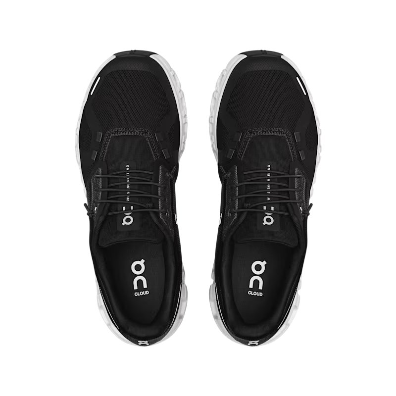 Vista dall'alto scarpa running On Cloud 6 donna nero-bianco design iconico
